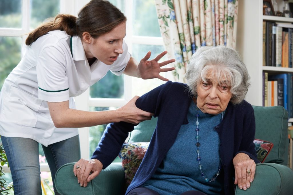 Caregiver shouting at a senior