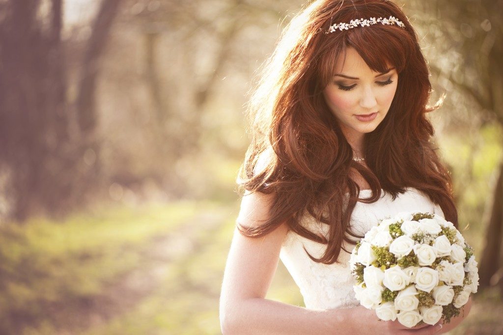 bride carrying her bouquet