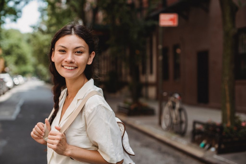 smiling traveling woman