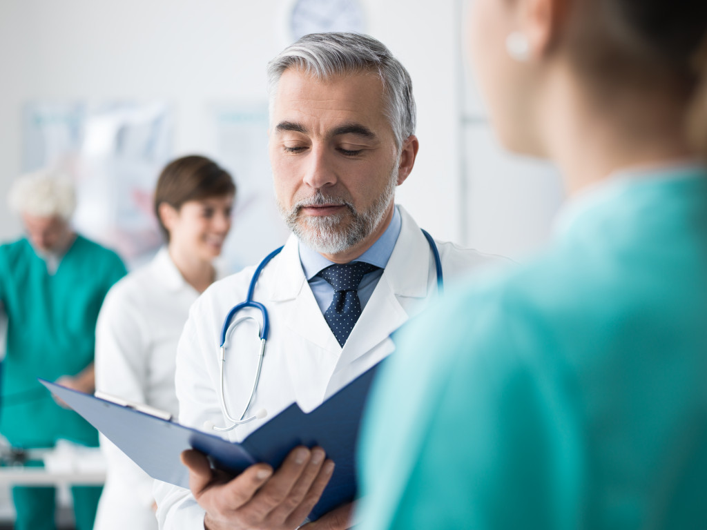 doctor talking to patient